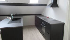 Departamento clásico, 2 camas Queen size | Cocina privada