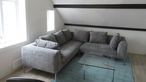 Departamento clásico, 2 camas Queen size | Área de sala de estar