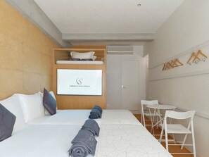 Desk, free WiFi, bed sheets
