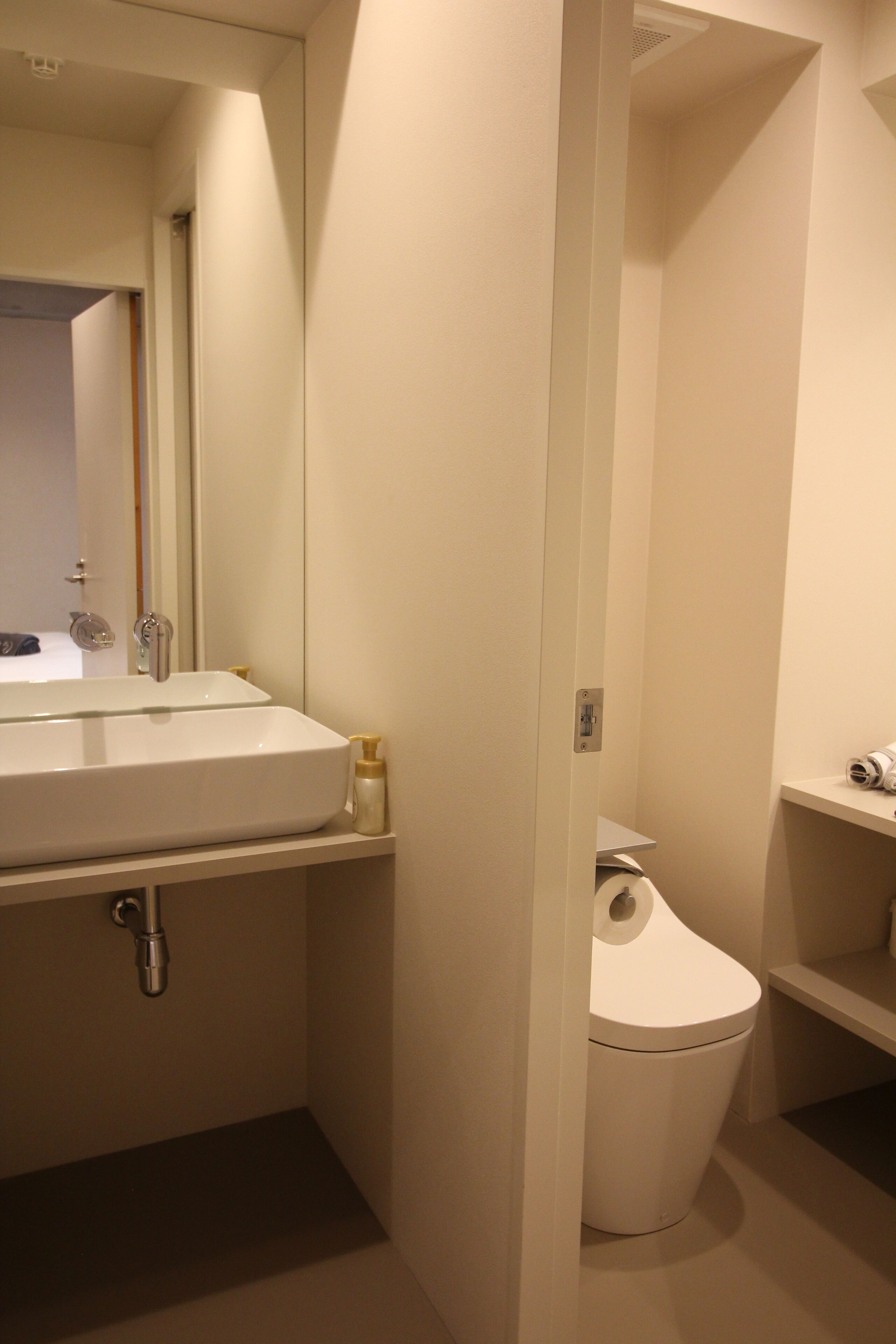 family room | bathroom | free toiletries, hair dryer, slippers, electronic bidet