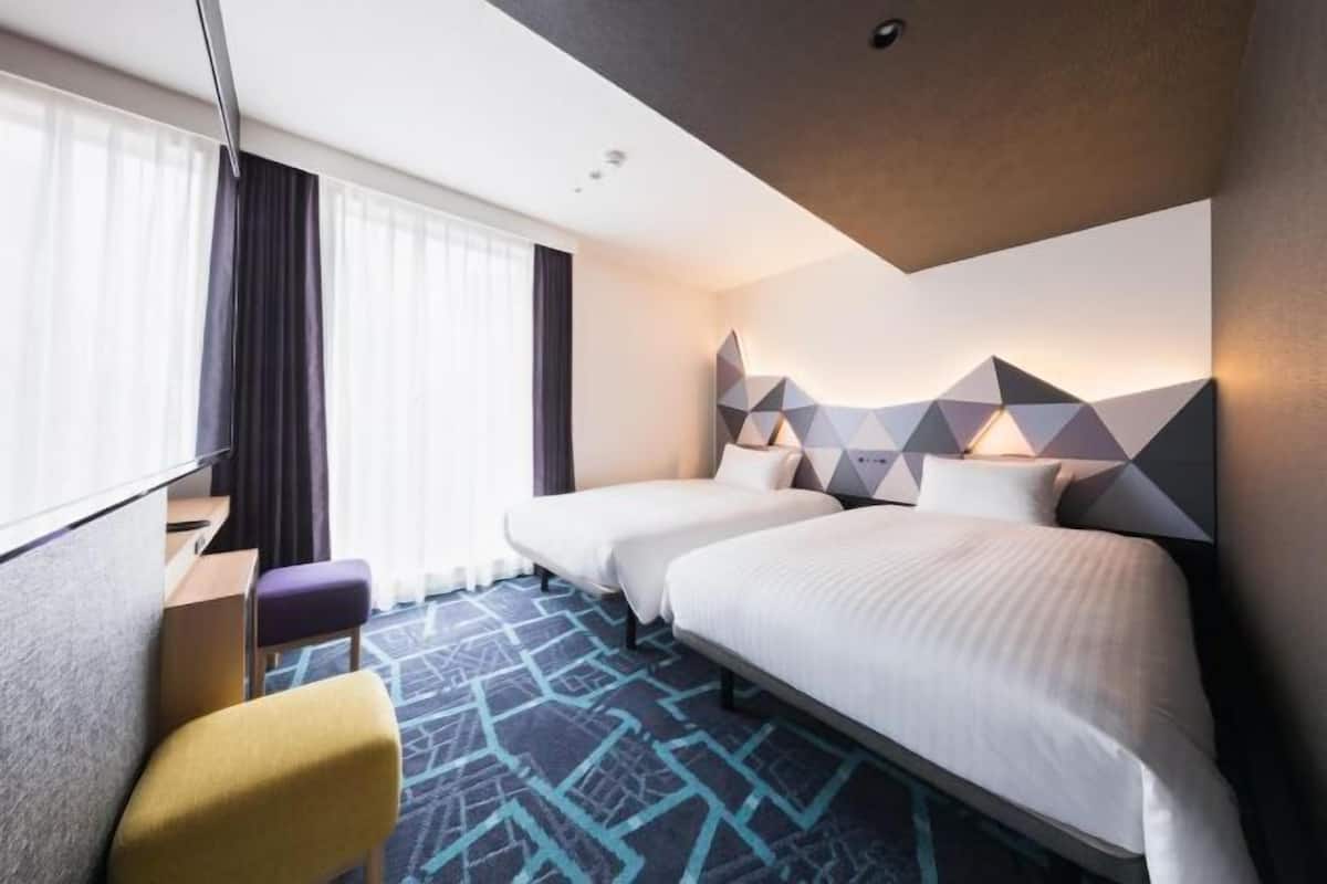 Down duvets, desk, blackout curtains, free WiFi