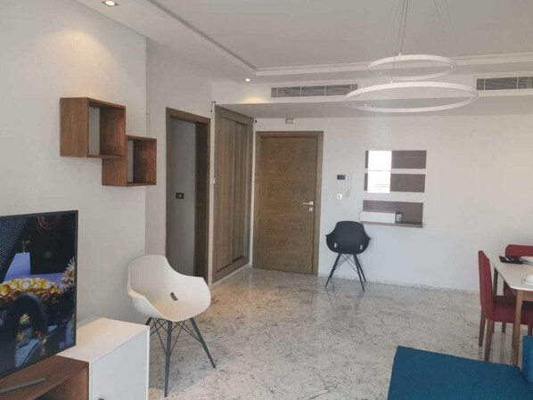 Apartment, 2 Bedrooms | Living area | Flat-screen TV - The cozy corner of J. CARTHAGE (Tunis)