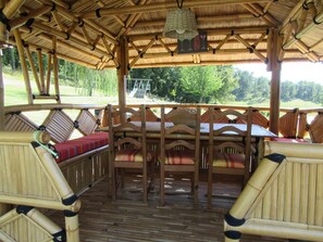 Outdoor dining - Villa ''Maeltri'' 12 people with heated pool and air conditioning. Optional spa area (jacuzzi + infrared sauna + cocooning chalet) (Léguillac-de-l'Auche)