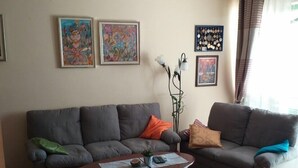 Family Apartment, City View | Living room | 40-inch LCD TV with cable channels, TV - City Center Apartment (Bar)