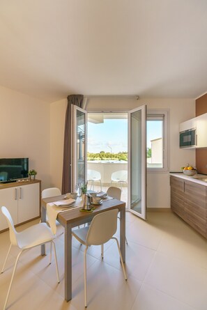 Deluxe Apartment, Kitchenette, Pool View | Balcony view - Travini Hotel Residence (Marsala)