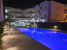 Seasonal outdoor pool, open 9:00 AM to 7:00 PM, sun loungers
