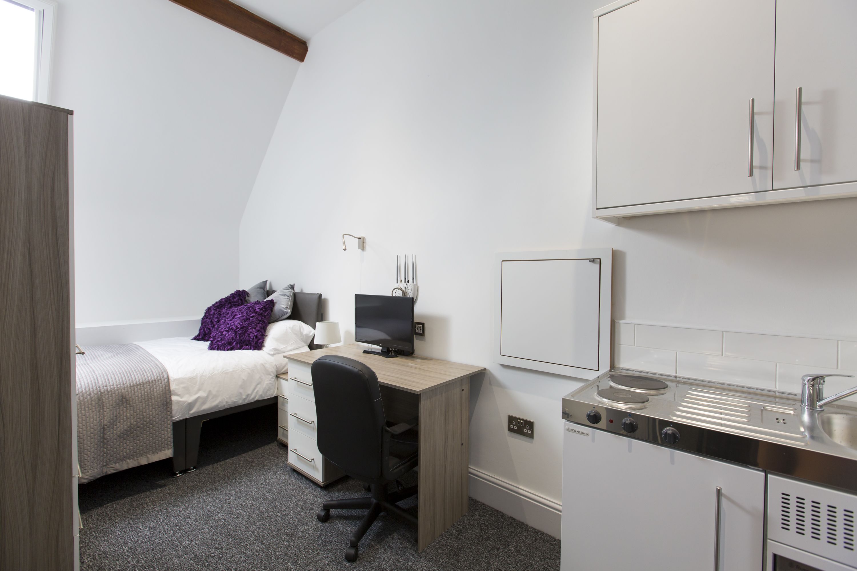 24-inch flat-screen TV with satellite channels, Smart TV