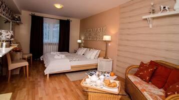 Family Quadruple Room, 1 King Bed with Sofa bed, Non Smoking, Courtyard View | Room amenity