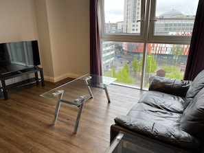 Appartement Ville, 1 chambre | Coin séjour | Télévision à écran plat de 40 pouces avec chaînes par satellite