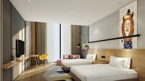 A modern hotel room with two beds, a desk, a chair, and a large wall art piece. - Q-Box Hotel Shanghai Nanqiao (Shanghai)
