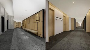 A modern hotel corridor with a bench, wooden lockers, and numbered doors. - Q-Box Hotel Shanghai Nanqiao (Shanghai)