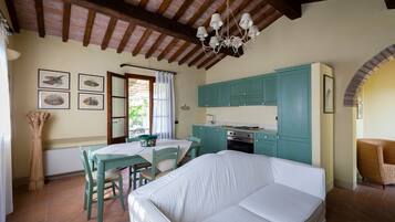 Executive-Apartment | Wohnbereich | Flachbildfernseher