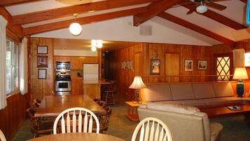 Flat-screen TV, fireplace, DVD player, books