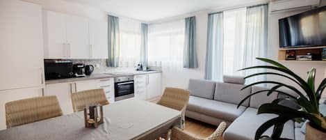 Appartement Majestueux, plusieurs lits, vue jardin | Cuisine privée