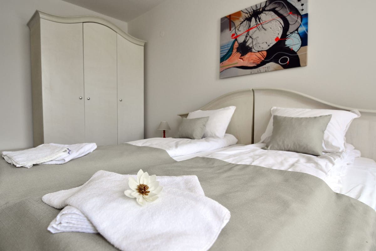 Classic Room, 2 Single Beds, River View | In-room safe, blackout curtains, soundproofing, iron/ironing board