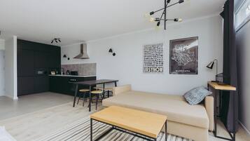 Comfort Apartment, City View | Living area | Flat-screen TV