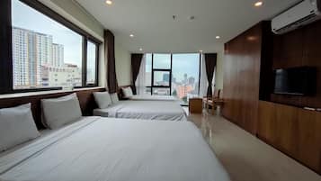 Family Room, Ocean View | Desk, soundproofing, free WiFi, bed sheets