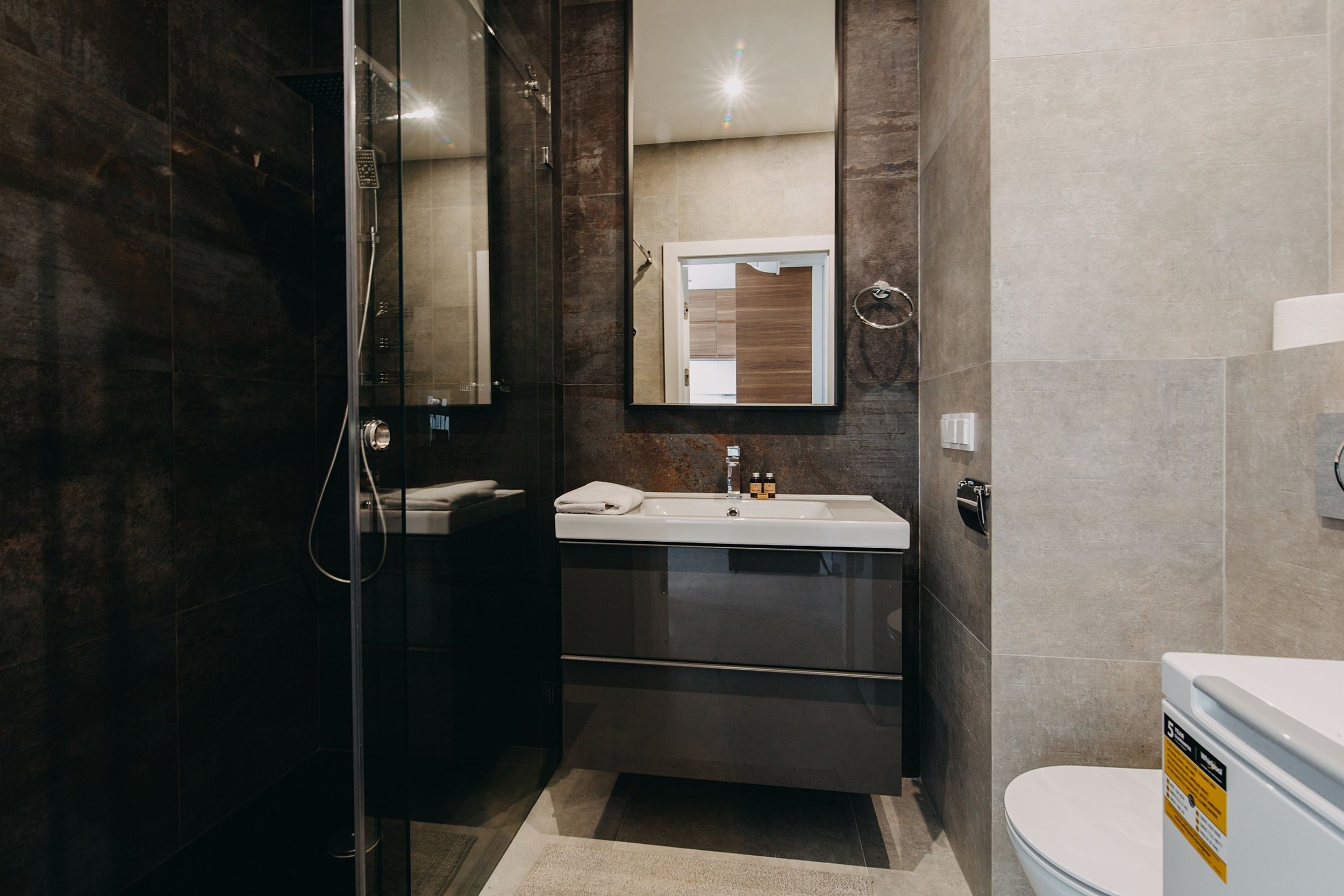 Exclusive Apartment, City View | Bathroom | Shower, hair dryer, towels, soap
