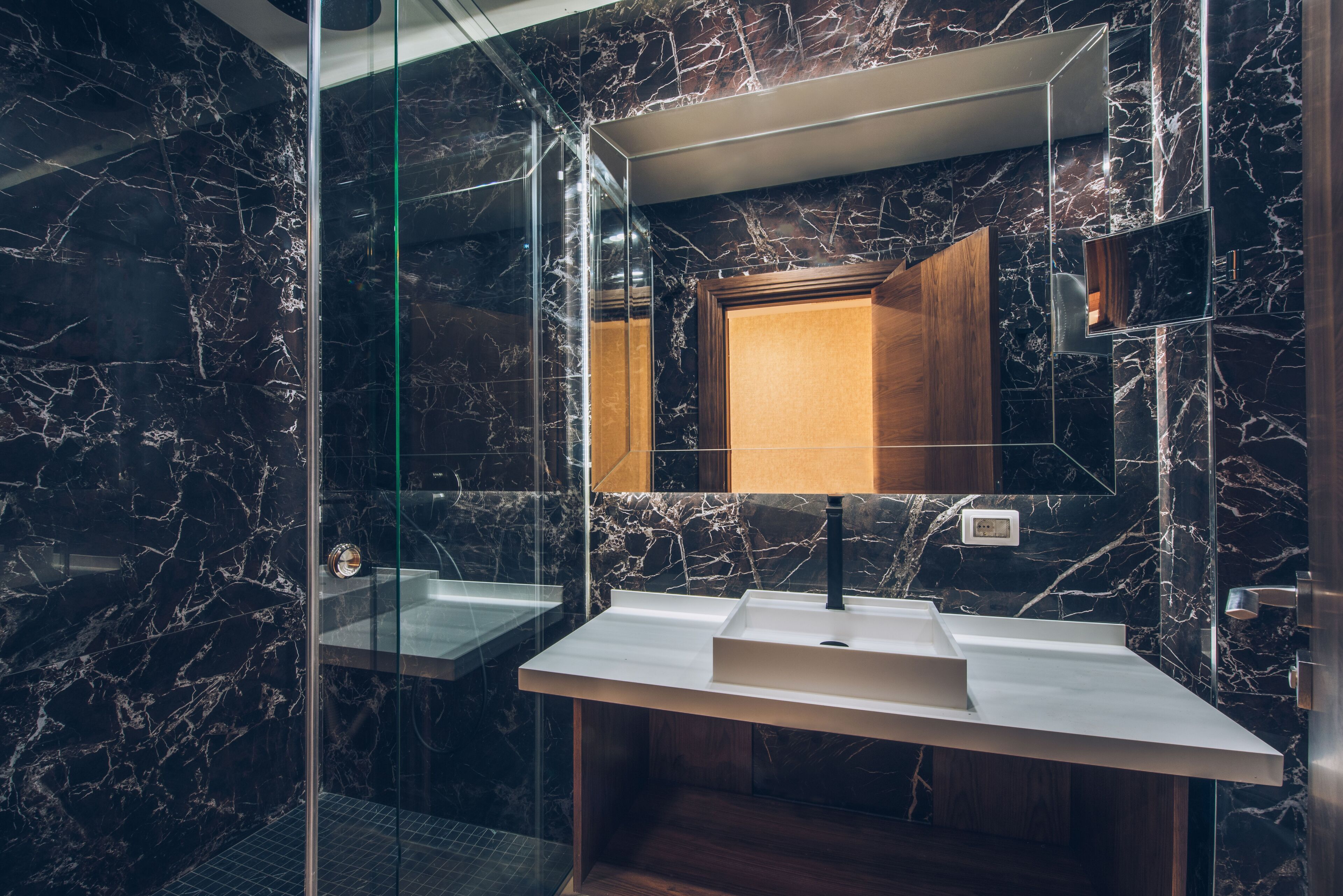 shower, eco-friendly toiletries, slippers, towels