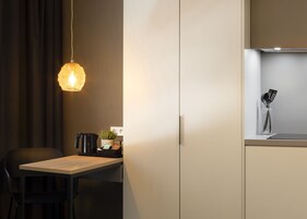 Fridge, microwave, stovetop, coffee/tea maker