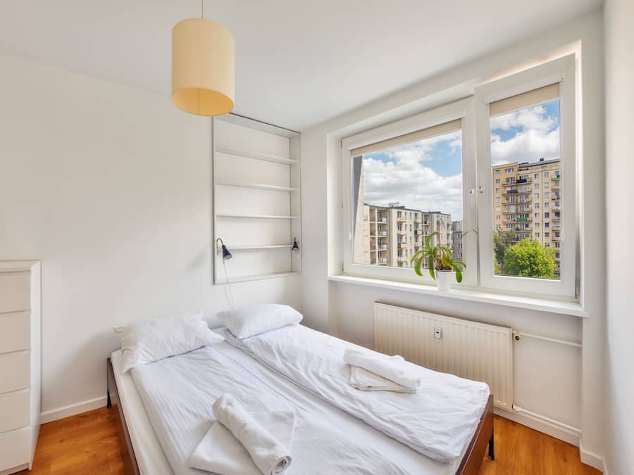 Apartment (12 – 3 Maja 19) | Laptop workspace, iron/ironing board, bed sheets