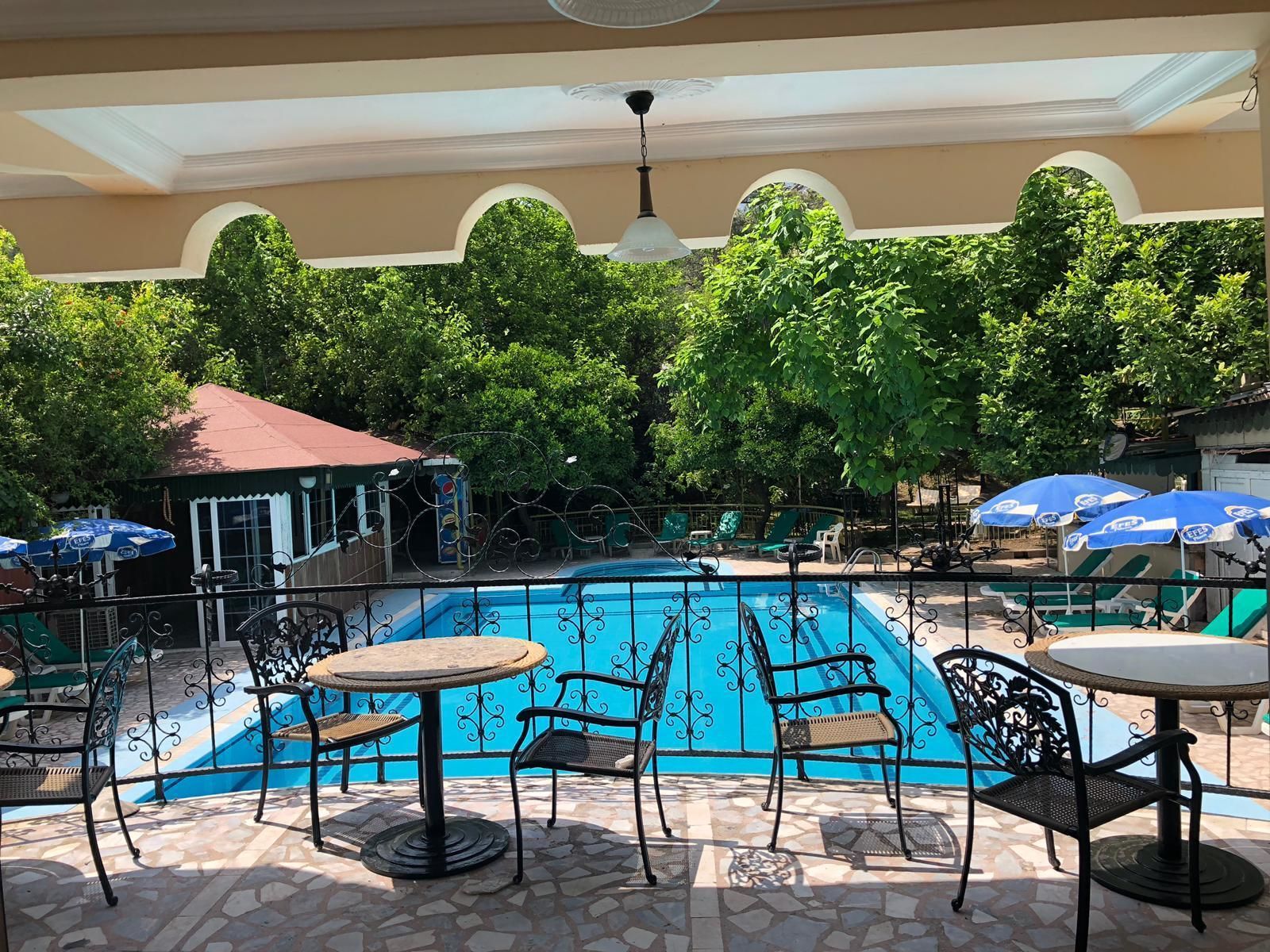 Outdoor pool, open 10:00 AM to 7:00 PM, sun loungers
