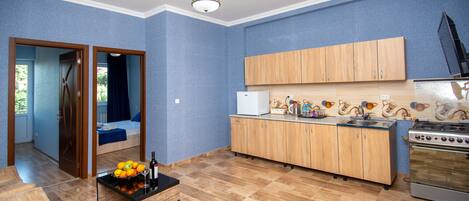 Enjoy cooking in this well-equipped kitchen with an oven and ample counter space.