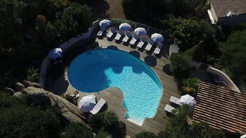 Outdoor pool, pool umbrellas, sun loungers