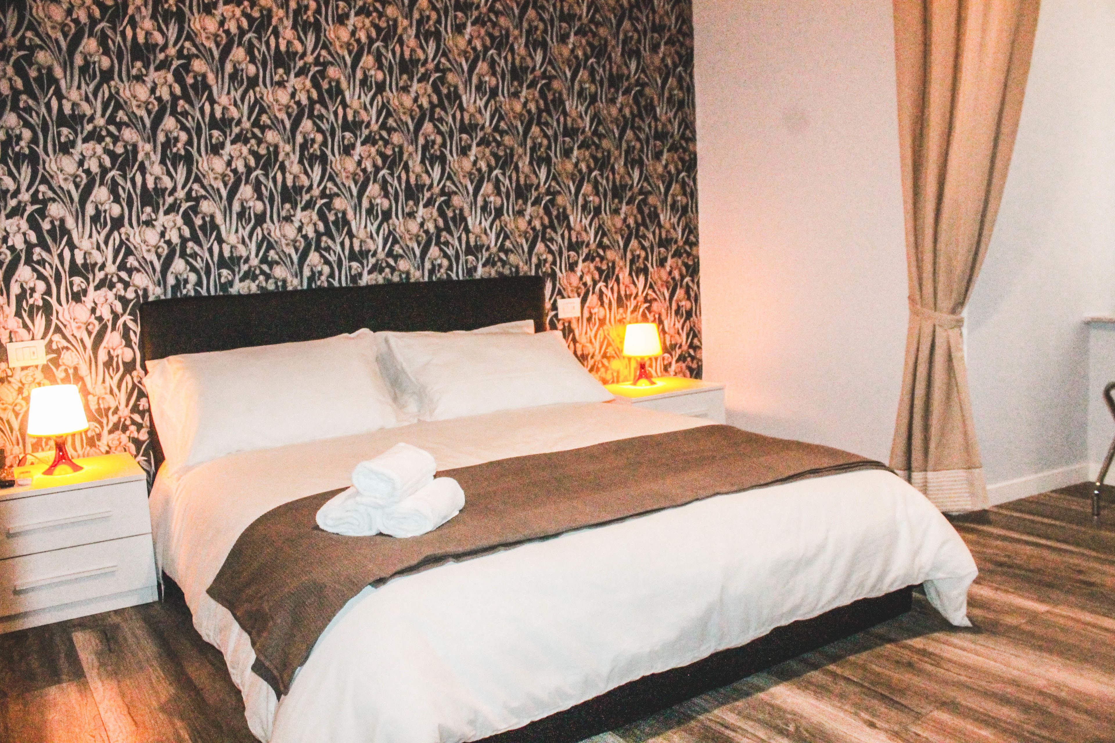 Premium bedding, down comforters, desk, laptop workspace