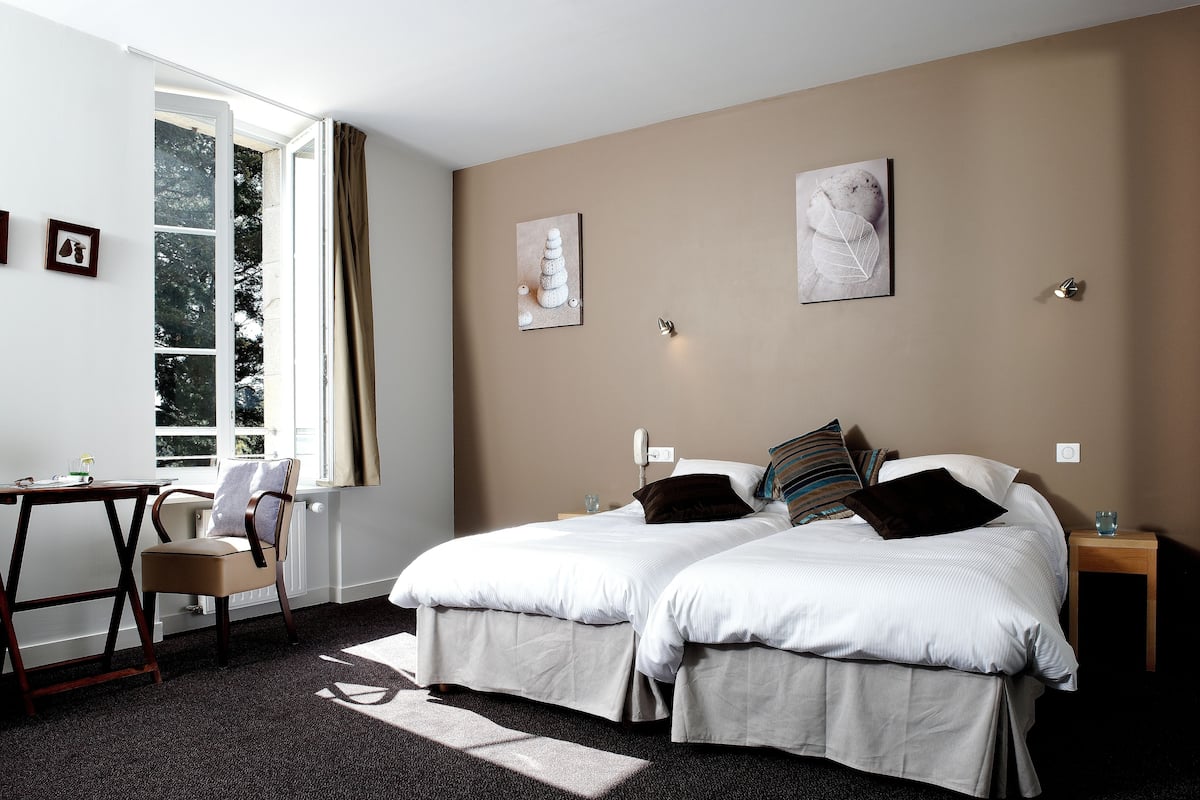 Chambre avec lits jumeaux | 1 chambre, fer et planche à repasser, accès au Wi-Fi (inclus)