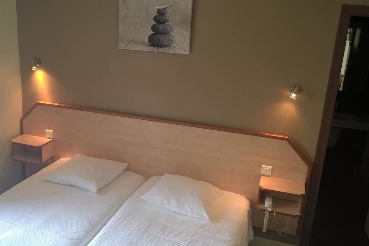 Chambre avec lits jumeaux, vue sur la mer | 1 chambre, fer et planche à repasser, accès au Wi-Fi (inclus)
