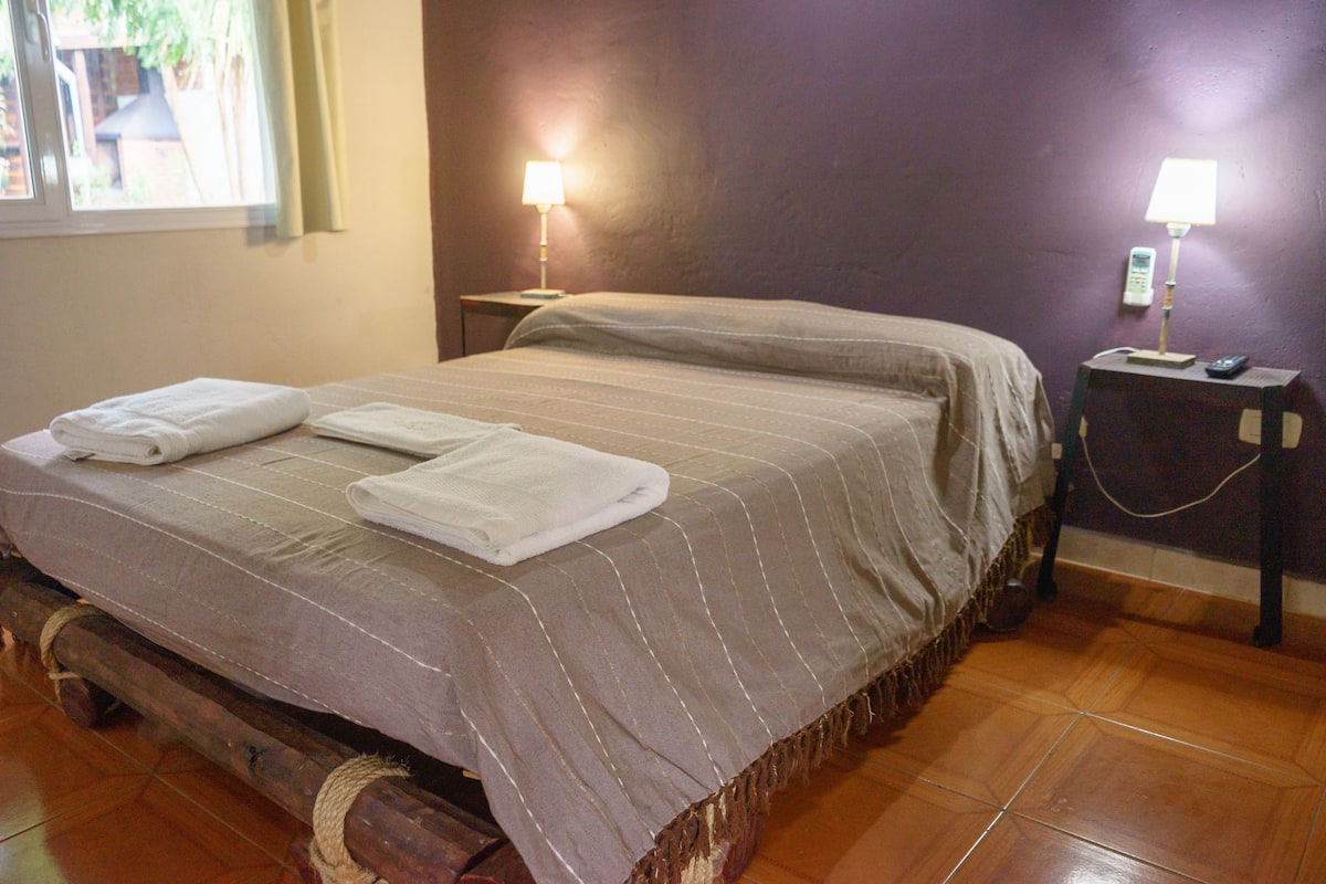 Family Cabin, 1 Bedroom, Ensuite, Garden View | 1 bedroom, laptop workspace, blackout curtains, soundproofing