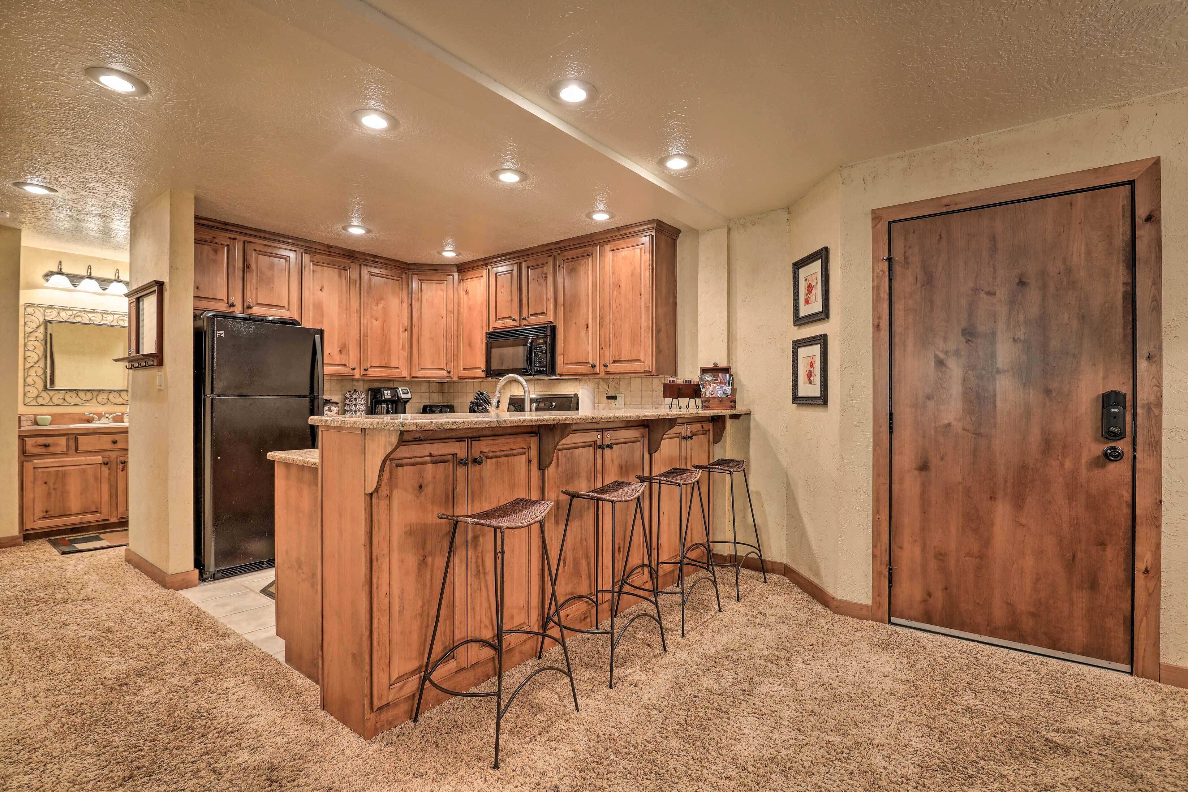 Fridge, microwave, stovetop, coffee/tea maker
