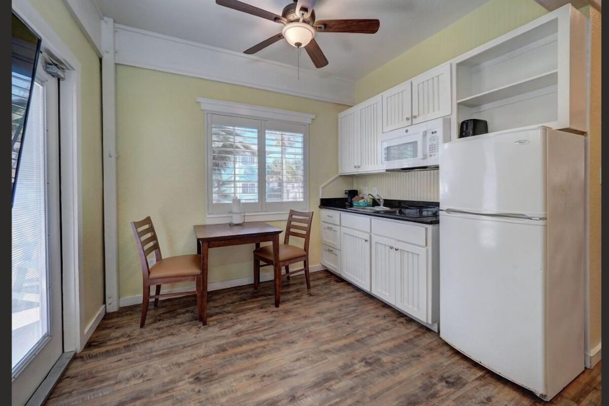 Kitchenette Suite | Iron/ironing board, WiFi (free), individually furnished, bed sheets