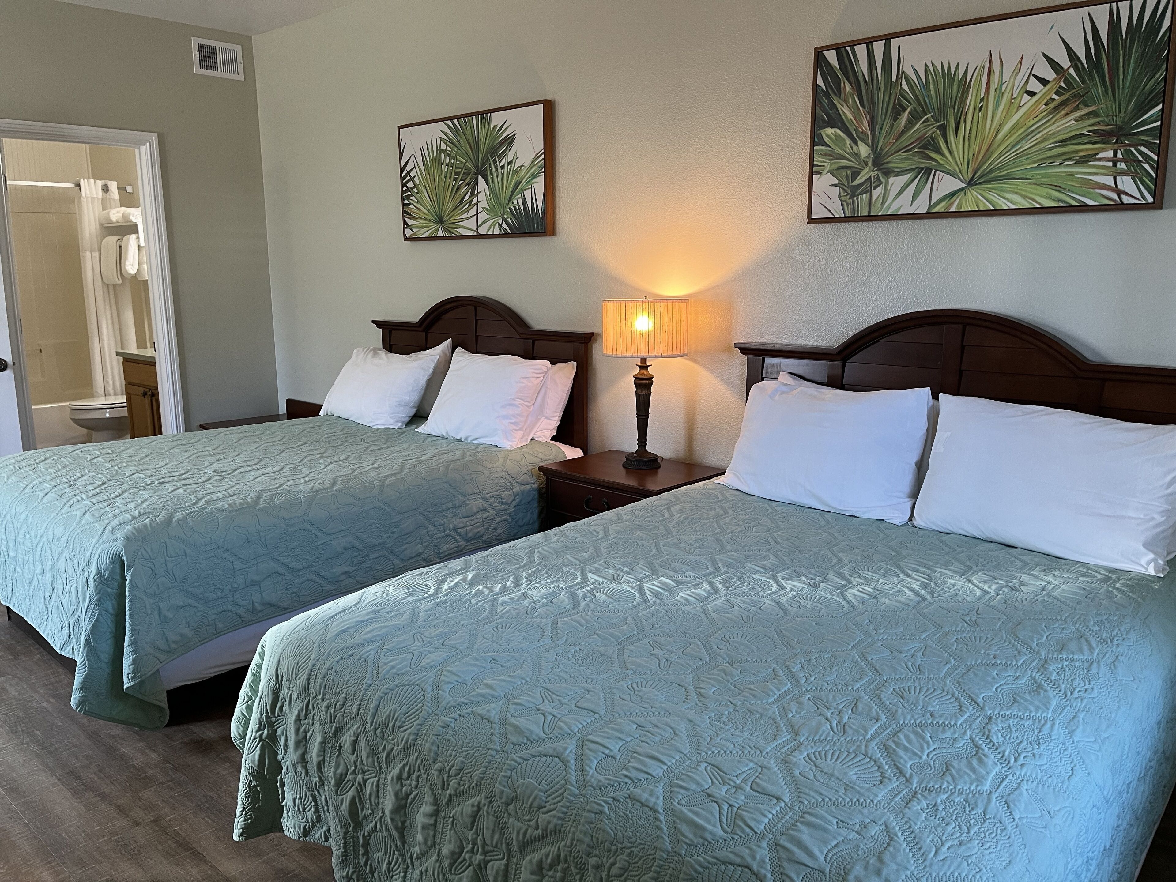 deluxe suite, multiple beds | 2 bedrooms, individually furnished, iron/ironing board, free wifi