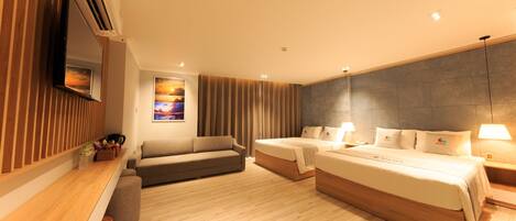 Deluxe Quadruple Room, 2 Queen Beds | 1 bedroom, minibar, in-room safe, desk