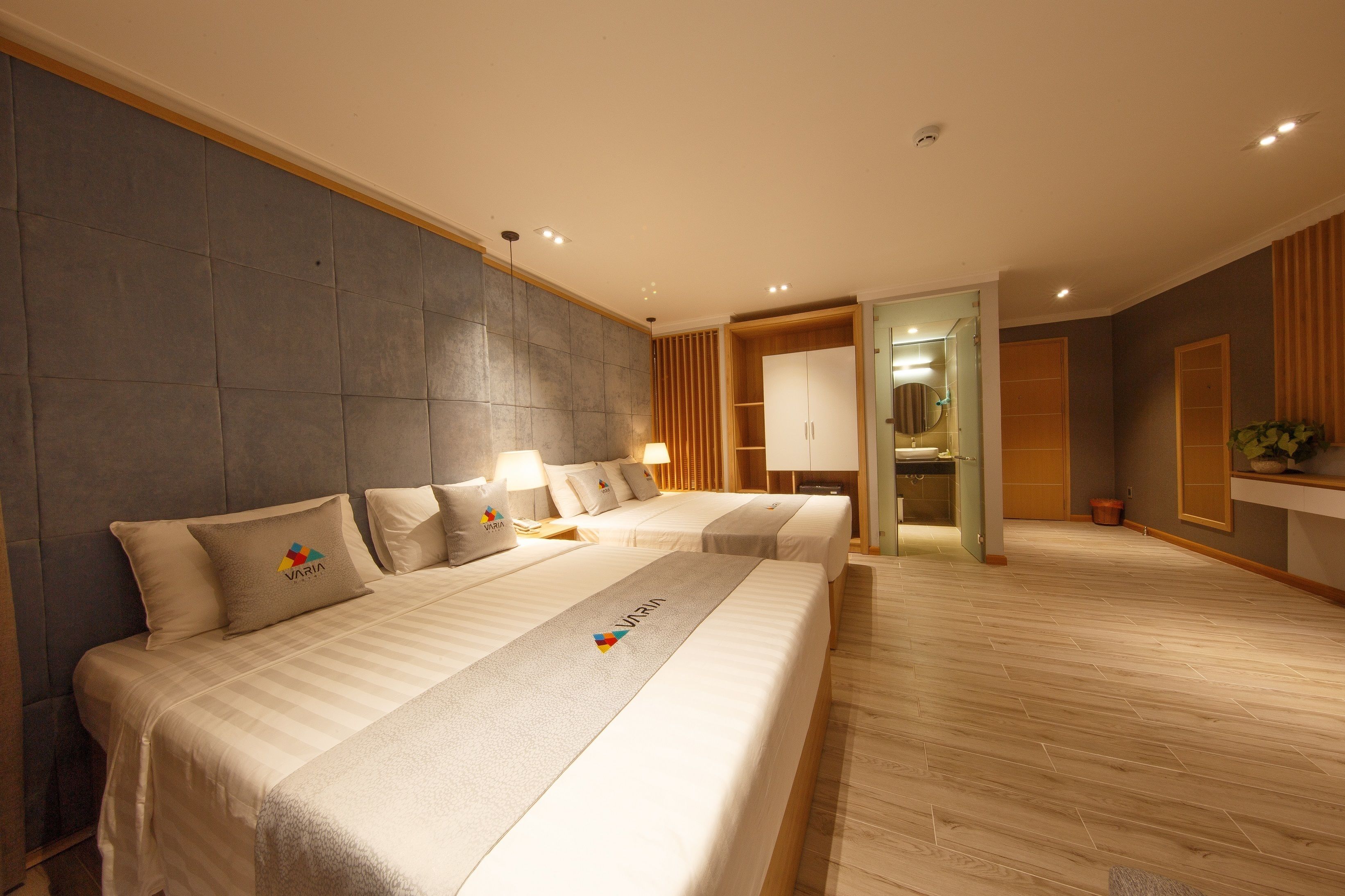 Superior Quadruple Room, 2 Queen Beds | Minibar, in-room safe, desk, blackout drapes