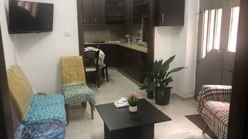 Deluxe Apartment | Living area