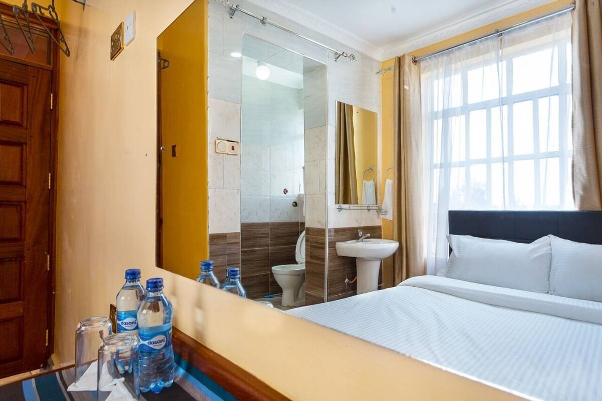 Premium bedding, memory-foam beds, desk, laptop workspace