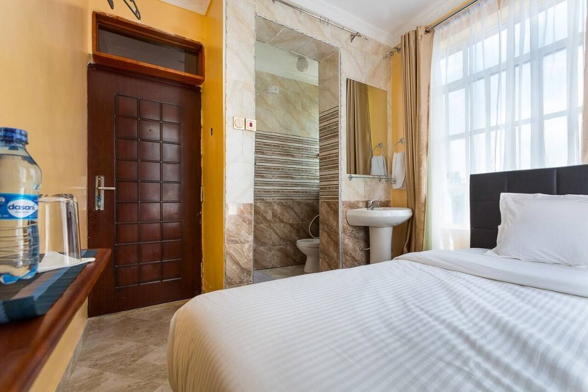 Premium bedding, memory-foam beds, desk, laptop workspace