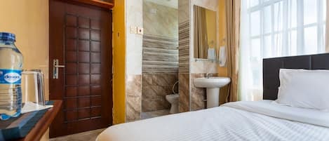 Premium bedding, memory foam beds, desk, laptop workspace