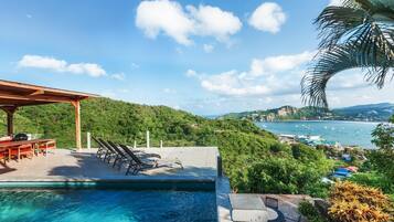 Outdoor pool, open 7:00 AM to 11:00 PM, sun loungers