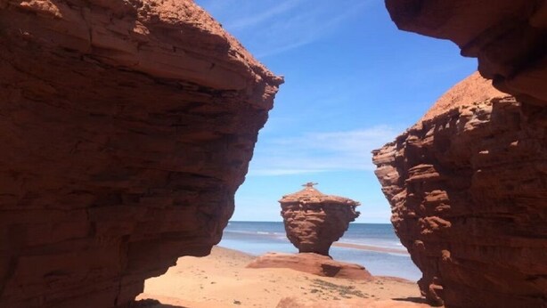 A natural rock formation with a clear sky. - Family Wellness Space on 4 acres (Kensington)