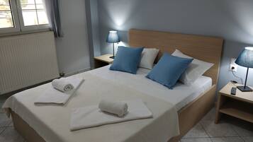 Family Apartment, 1 Bedroom | 1 bedroom, soundproofing, iron/ironing board, free cribs/infant beds