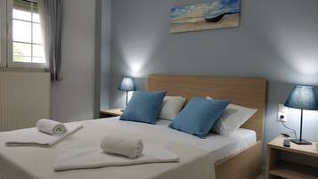 Family Apartment, 1 Bedroom | 1 bedroom, soundproofing, iron/ironing board, free cots/infant beds