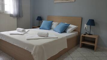 Family Apartment, 1 Bedroom | 1 bedroom, soundproofing, iron/ironing board, free cribs/infant beds