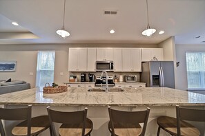 Fridge, microwave, oven, stovetop - Wonderful 4 bedroom 2.5 bath - Nestled in a quiet Community! Wifi Available, Pool, Beach Trolley! (Ocean View)