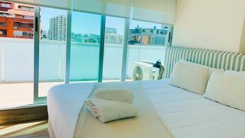 Superior Apartment | Hypo-allergenic bedding, down comforters, in-room safe