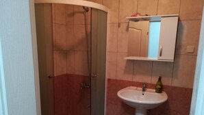 Appartement Confort | Douche de la salle de bain