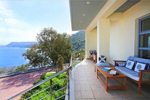 Villa | Balcony - Seafront home 4' walk to private beach (Malevizi)